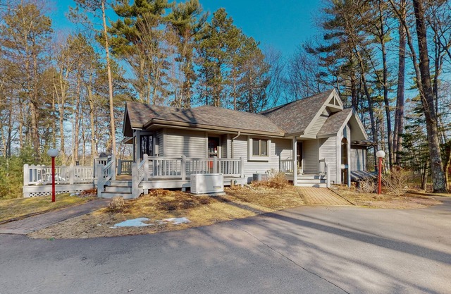 Lakefront home with private outdoor sauna, dock, firepit, wood fireplace & patio