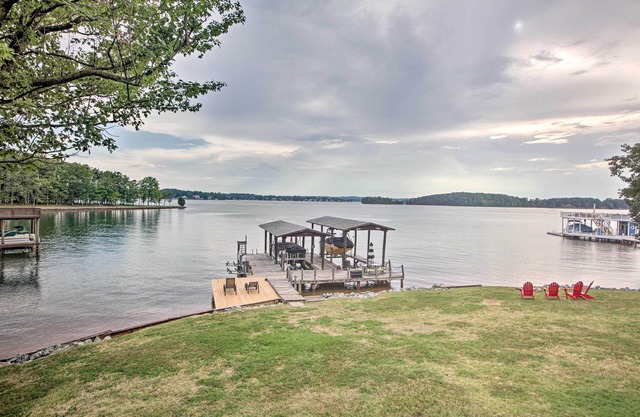 Lakefront Living with Dock, Fire Pit & Sunroom!