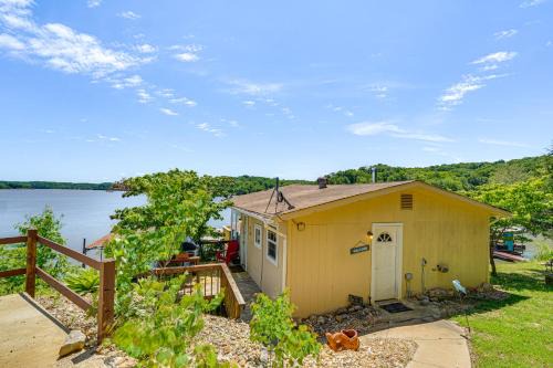 Lakefront Ozark Cottage Deck with Covered Dock!