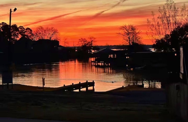 Lakefront retreat with pickleball, boat launch, putting green, pool table & stunning lake views!