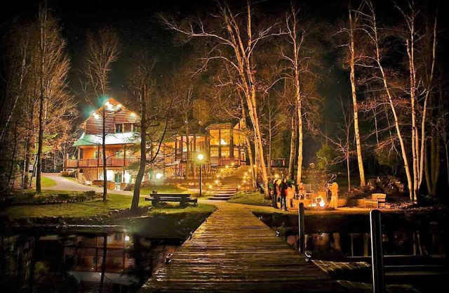 Lakefront secluded mult-family retreat with game room and two cabins.