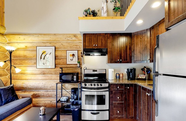 Lakefront wilderness resort cabin with private deck, grill, & WiFi