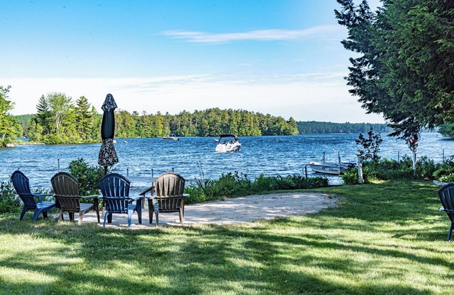 Lakehouse with large level yard on pristine Little Sebago Lake