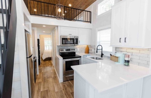 Lakeside Chic: Stylish Family Tiny Home Retreat #4