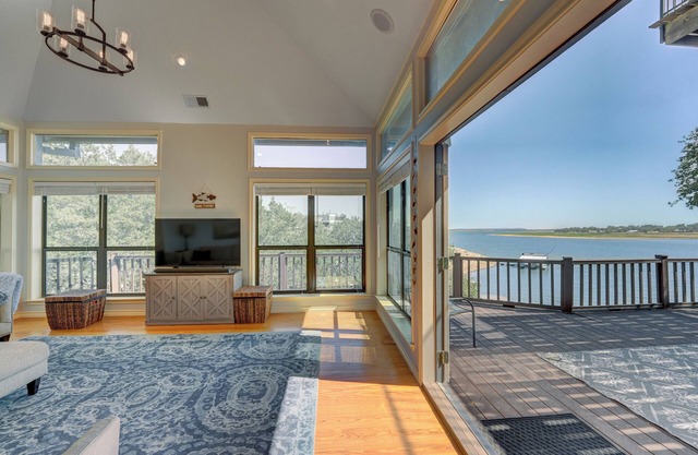 Lakeside Leisure - Peaceful waterfront home with a boat dock and game room.