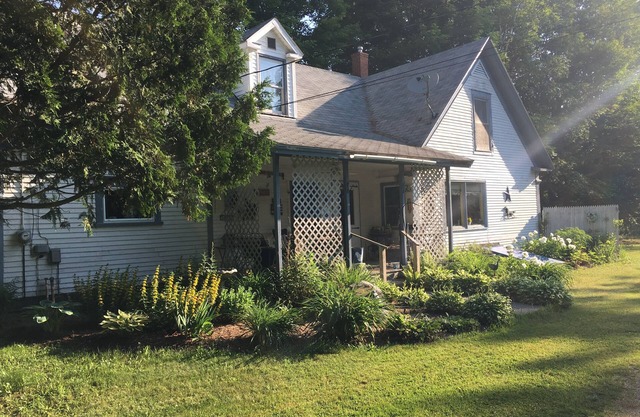 Lakeview Farmhouse with private beach access and on snowmobile VAST trail.
