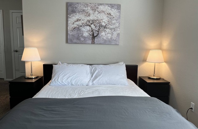 Large bedroom with private entrance, bathroom and thermostat