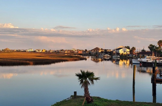 Large boat slips, close to marina and gulf access, water on 3 sides, great views