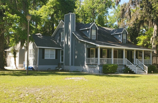 Large custom home with pool centrally located to beaches, parks, and family fun.