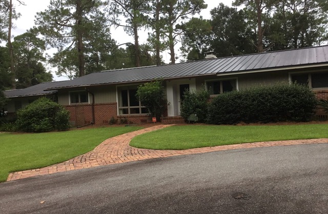Large home on acreage conveniently located