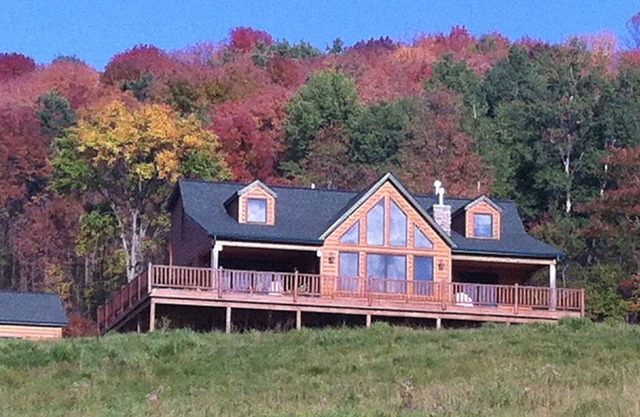 Large home with 5 bedrooms, 4 baths, sleeps up to 12, large 60 ft. deck, hot tub