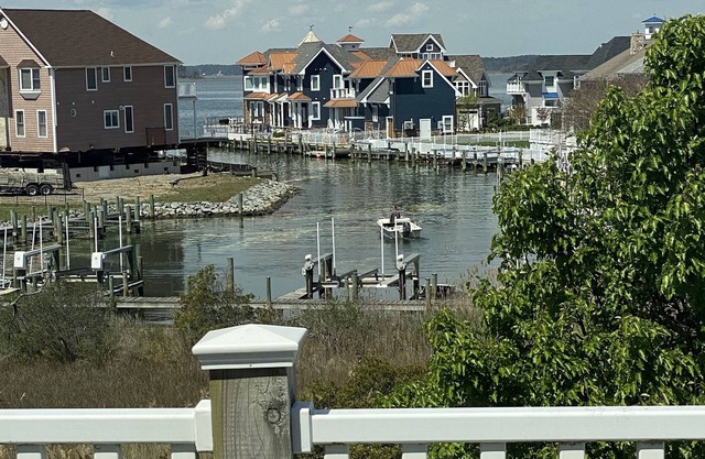 Large Luxury home at 120th; Bayfront Views, private pools, walk to Beach