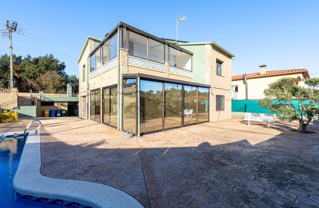 Large outdoor area with private pool and barbecue