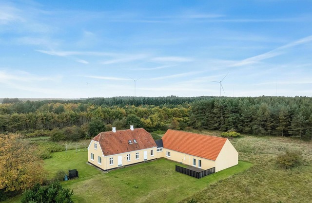 Large pool house with activity room located in peaceful surroundings.