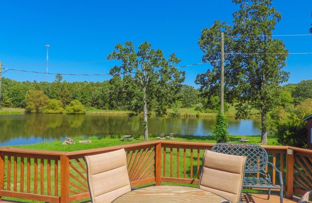 Leasburg Lakehouse vacation home & private stocked lake near Meramec River.