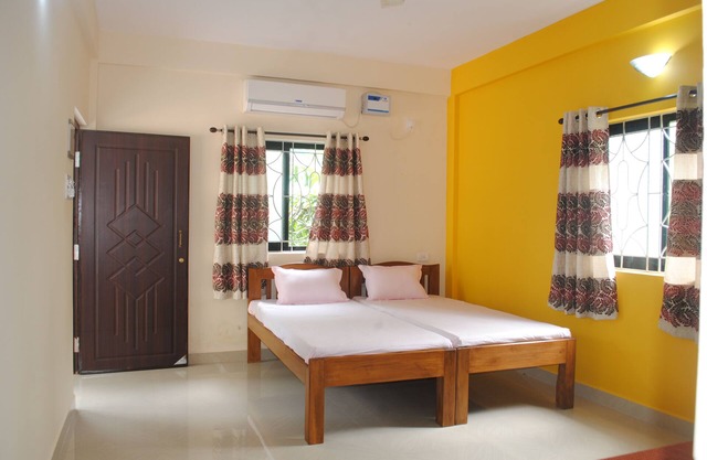 LEMONDROP TWIN BEDDED ROOM with open terrace
