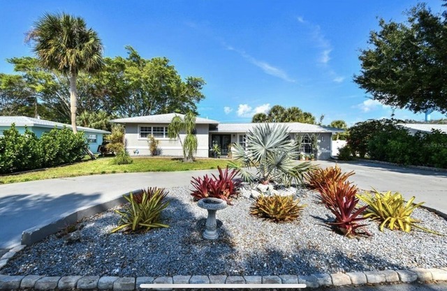 Less than a mile to beach! heated pool! 4 bedrooms, 3 bathrooms private house.