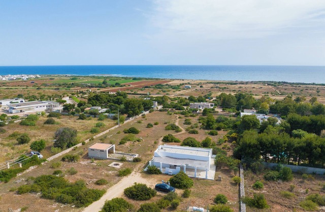 LiAMA Detached villa surrounded by greenery with panoramic sea views.