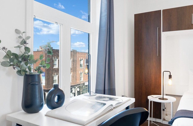 Liv MTL* 55% Off * MTL 301 Modern Studio | Relaxed Getaway + Spacious Rooftop Patio + Office + Pets Stay Free!
