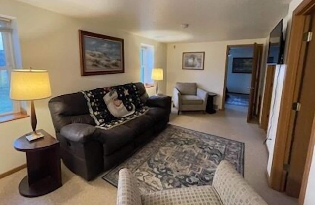 Live. Work. Play. Scenic Waterfront Apt in Two Rivers!