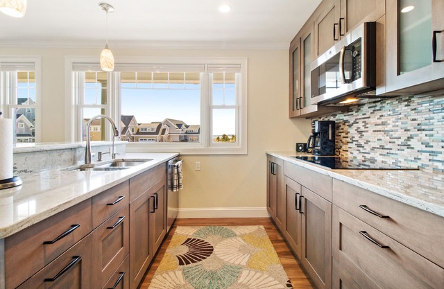 Located directly on the white sands of Pine Point Beach.