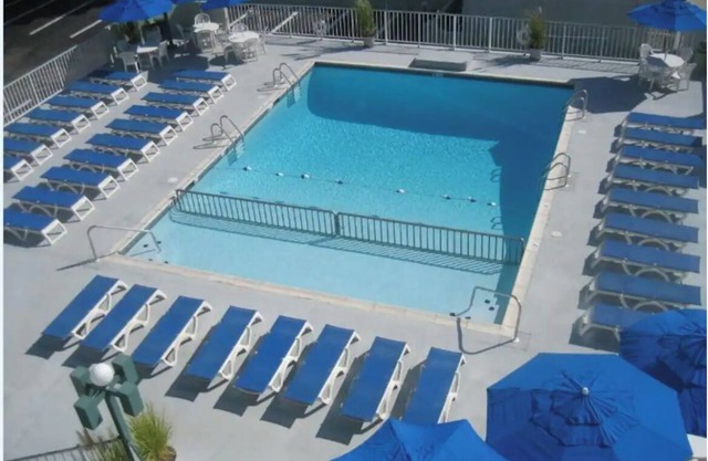 Location Location!! 1 block to the beach w/Heated Pool, private bedroom/kitchen