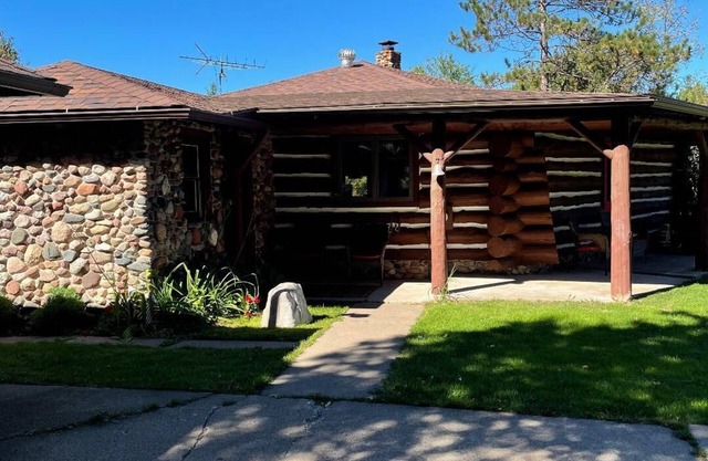 Log Cabin on 40 acres with a private lake