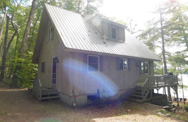 Long Lake chalet and guest house with 200' of water frontage and sunset views