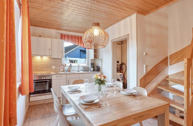 Gemütliche Wohnung in einem Ferienhaus für 4 Personen mit W-LAN, TV, Terrasse und Parkplatz
