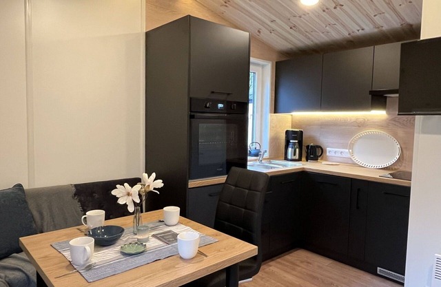 Angenehme Wohnung in einem Ferienhaus für 4 Leute mit W-LAN, TV, Terrasse und Parkplatz
