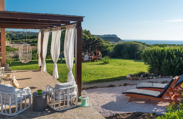 Nettes Haus mit Meerblick, nur wenige Gehminuten vom idyllischen Strand entfernt: Casa Ginepro