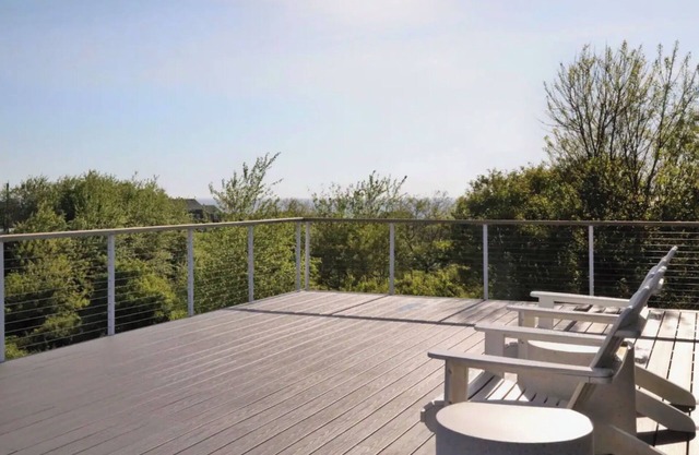 Lovely Home with quaint living spaces and 180 views of the Atlantic Ocean.