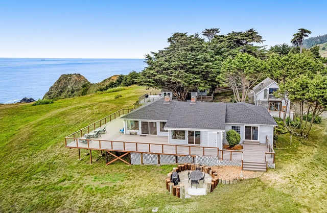 Lovely oceanfront home with large deck, panoramic views, firepit, & W/D