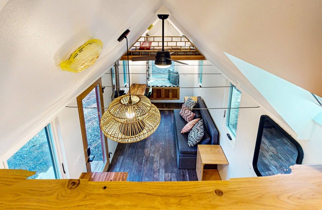 Lovingly crafted tiny home with wood stove, grill, & serene views