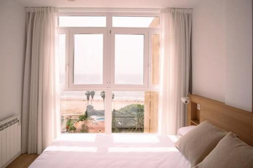 Luminoso estudio con vistas al mar
