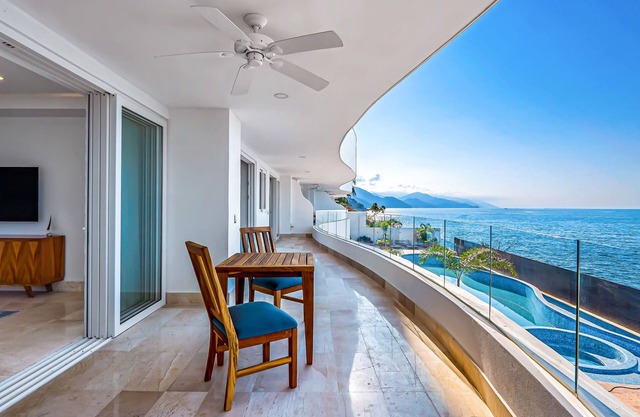 Luxe 2nd-floor condo with endless ocean views, pool, spa & balcony