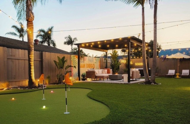 Luxe Backyard Retreat Near Beach: Hot Tub, Mini-Golf, Fire Pit, BBQ, Playground