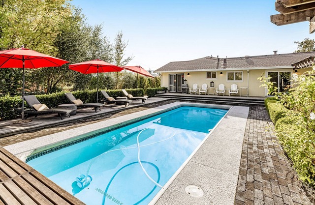 Luxe estate with mountain views and outdoor oasis, with pool, hot tub, & firepit