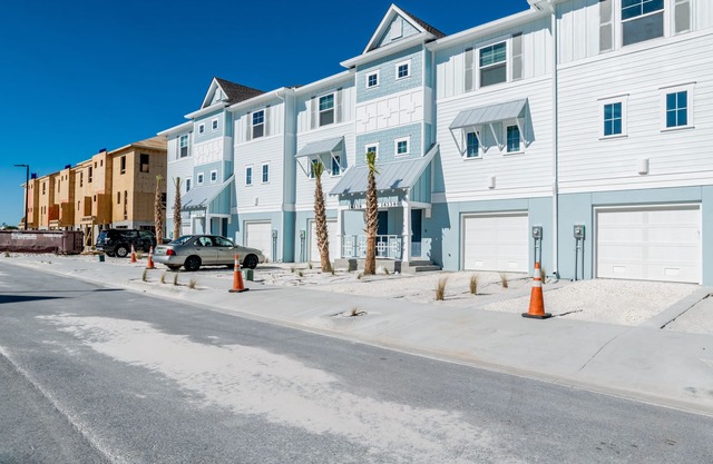 Luxe Living Awaits: Beautiful Townhome Epitomizes The Lost Key Lifestyle!