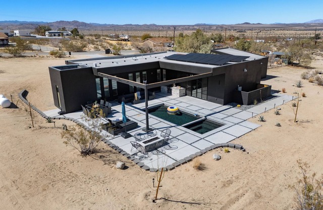 Luxe Modern Escape w/ Pool, HotTub, Firepit, Desert View | Obsidian by AvantStay