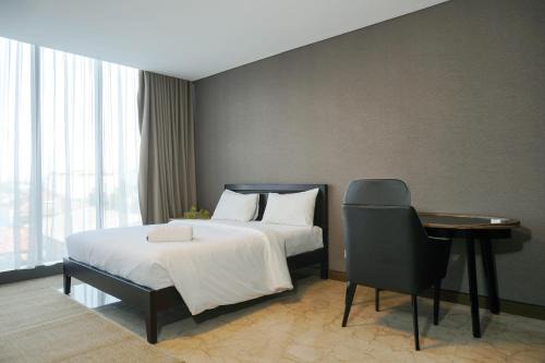 Luxurious 1BR at L'Avenue Apartment near Sampoerna Universitas By Travelio
