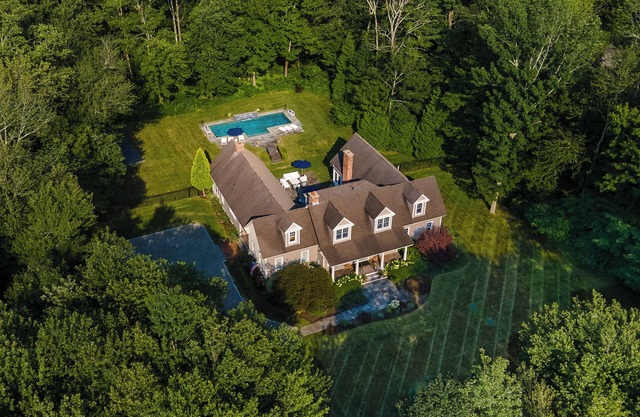 Luxurious 5-BR home in peaceful 3+-acre setting with heated, salt-water pool!