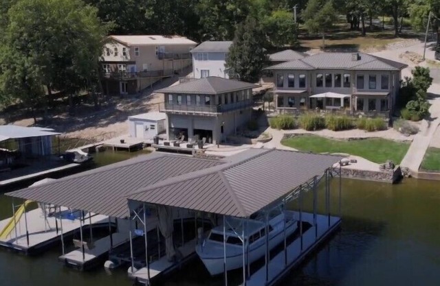 Luxurious indulgence in your very own, modern lakefront home with private dock!