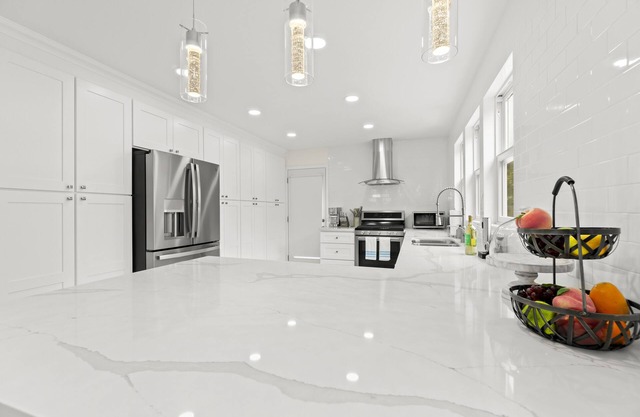 Luxurious & Tranquil Home with Private Backyard