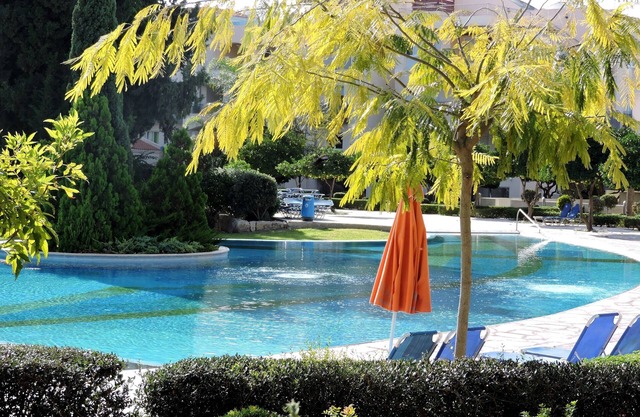 Luxus 1. Stock Apartment mit Poolblick