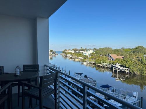 Luxury 2 Bed 2 Bath Waterfront Condo with Patio Sunsets Gym and Parking