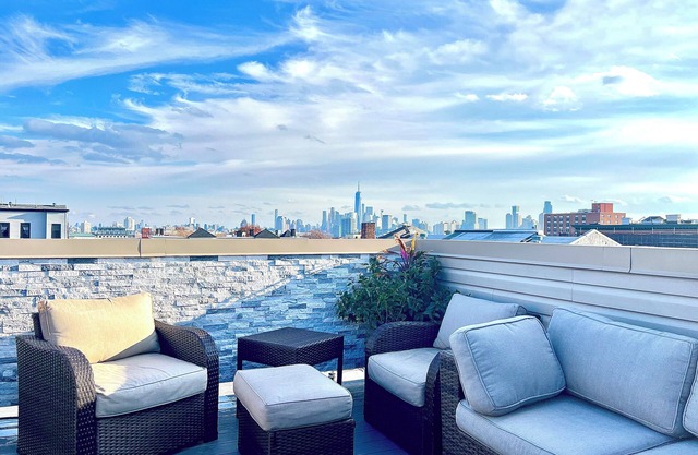 Luxury 2-bedroom condo in charming Jersey City with private deck and NYC views