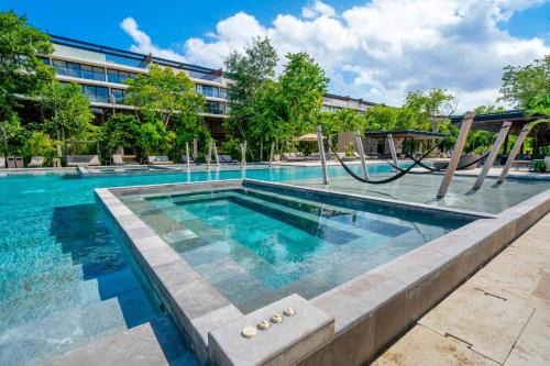 Luxury 2 Bedroom Condo - Infinity Pool at AWA Residences in Playacar, AWA 107