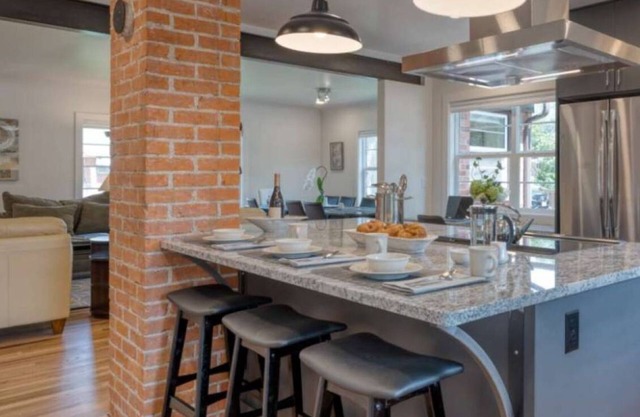 Luxury at its Finest | Indulge in Gourmet Kitchen, Spacious Dining Area, Lovely Patio & Plush Beds
