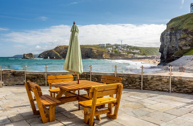 Luxury Beachfront cottage only 20 steps from the sand with private parking/patio